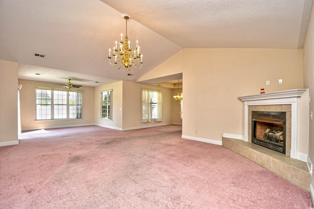 501 Painted Duck Ct, Myrtle Beach, SC 29588 - unfurnished living room with a chandelier, a tiled fireplace, carpet flooring, lofted ceiling, and ceiling fan