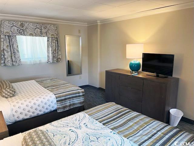 1105 S Ocean Blvd Unit 136, Myrtle Beach, SC 29577 - bedroom featuring crown molding