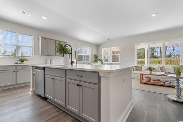197 Bantry Ln, Conway, SC 29526 - kitchen featuring gray cabinets, dishwasher, healthy amount of natural light, wood finished floors, and lofted ceiling