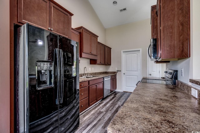 365 Lenox Dr, Conway, SC 29526 - kitchen with appliances with stainless steel finishes, high vaulted ceiling, and dark wood-type flooring