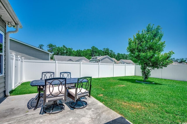 365 Lenox Dr, Conway, SC 29526 - fenced backyard featuring outdoor dining space