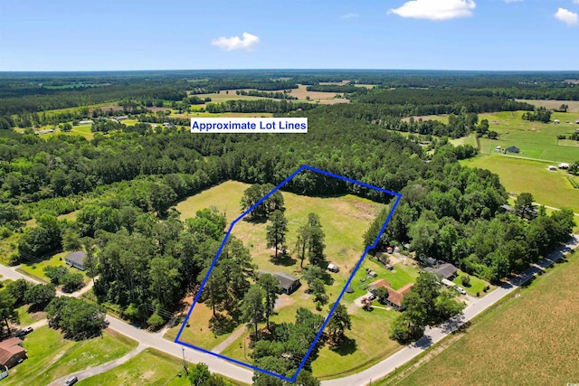 1206 French Rd, Mullins, SC 29574 - aerial view of property and surrounding area featuring a forest and property parcel outlined