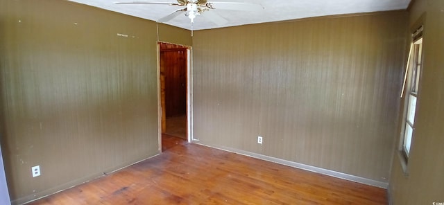 1206 French Rd, Mullins, SC 29574 - unfurnished room with a ceiling fan and wood finished floors