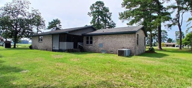 1206 French Rd, Mullins, SC 29574 - back of property with crawl space, entry steps, brick siding, and a yard