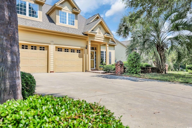 431 Huntington Lake Cir Unit 80, Pawleys Island, SC 29585 - view of front facade featuring concrete driveway and a shingled roof