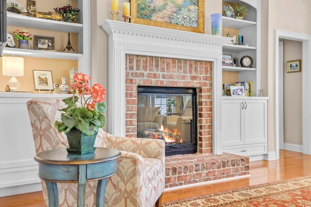 431 Huntington Lake Cir Unit 80, Pawleys Island, SC 29585 - detailed view of a fireplace, wood finished floors, and built in features