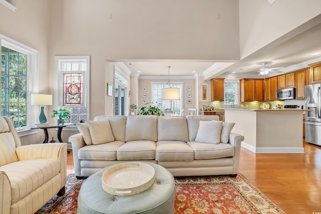 431 Huntington Lake Cir Unit 80, Pawleys Island, SC 29585 - living area with light wood-style floors, ornamental molding, a towering ceiling, a ceiling fan, and recessed lighting