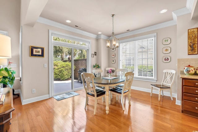 431 Huntington Lake Cir Unit 80, Pawleys Island, SC 29585 - dining space featuring a chandelier, light wood-type flooring, ornamental molding, and recessed lighting