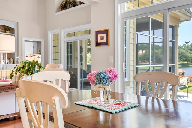 431 Huntington Lake Cir Unit 80, Pawleys Island, SC 29585 - dining area with a high ceiling