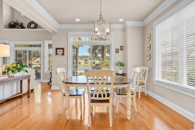 431 Huntington Lake Cir Unit 80, Pawleys Island, SC 29585 - dining room with light wood-type flooring, a chandelier, recessed lighting, and ornamental molding