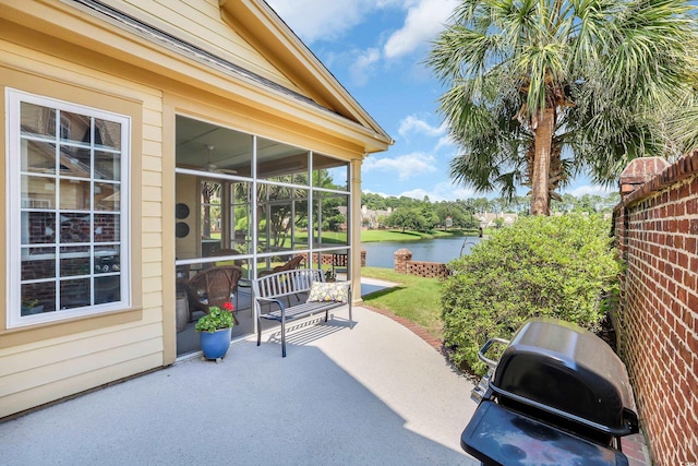 431 Huntington Lake Cir Unit 80, Pawleys Island, SC 29585 - view of patio with a water view, grilling area, and a sunroom