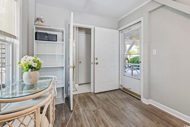 709 Triple Oak Ln, Garden City Beach, SC 29576 - entryway with wood finished floors and baseboards