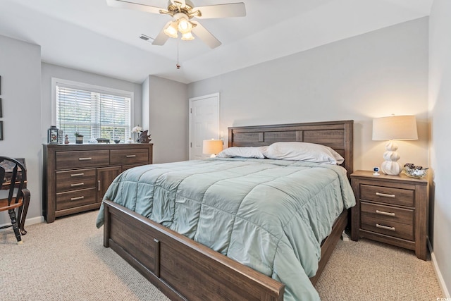709 Triple Oak Ln, Garden City Beach, SC 29576 - bedroom featuring light colored carpet and ceiling fan
