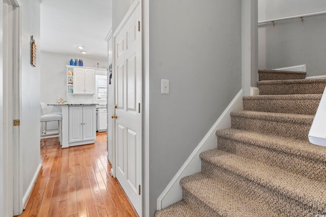 709 Triple Oak Ln, Garden City Beach, SC 29576 - stairs with wood-type flooring and baseboards