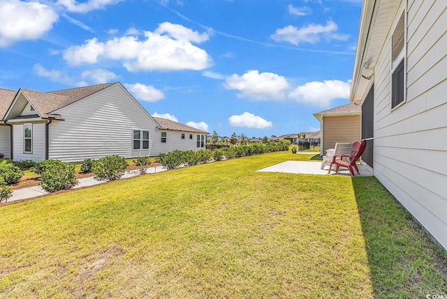1360 Littleleaf Loop, North Myrtle Beach, SC 29582 - view of grassy yard with a patio area