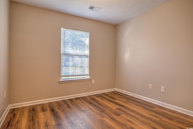 4524 E Walkerton Rd, Myrtle Beach, SC 29579 - spare room featuring wood finished floors and baseboards