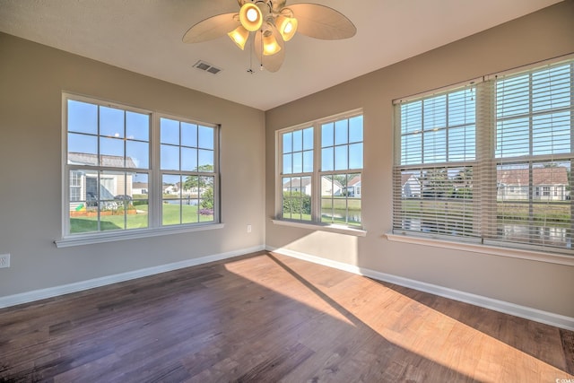 4524 E Walkerton Rd, Myrtle Beach, SC 29579 - spare room featuring wood finished floors and a ceiling fan