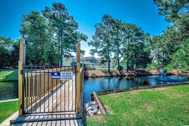 808 Myrtle Ct Unit 808, North Myrtle Beach, SC 29582 - dock with a water view and a gate