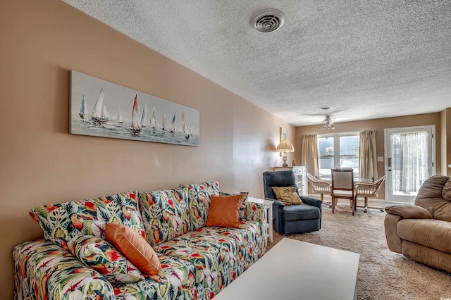 808 Myrtle Ct Unit 808, North Myrtle Beach, SC 29582 - living room with a textured ceiling and carpet floors