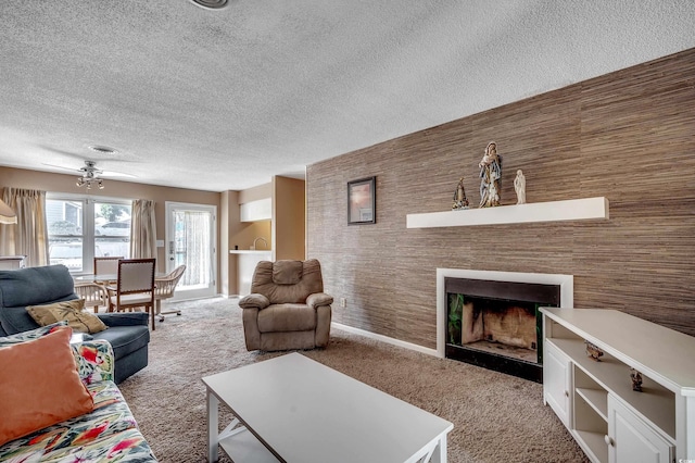 808 Myrtle Ct Unit 808, North Myrtle Beach, SC 29582 - carpeted living room with a fireplace and a textured ceiling