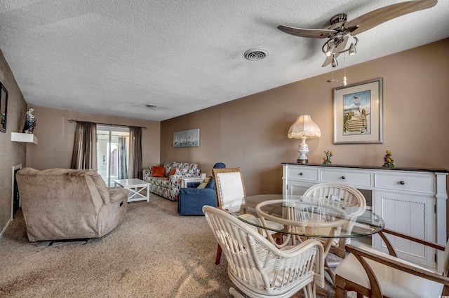 808 Myrtle Ct Unit 808, North Myrtle Beach, SC 29582 - dining space featuring a textured ceiling, a ceiling fan, and carpet