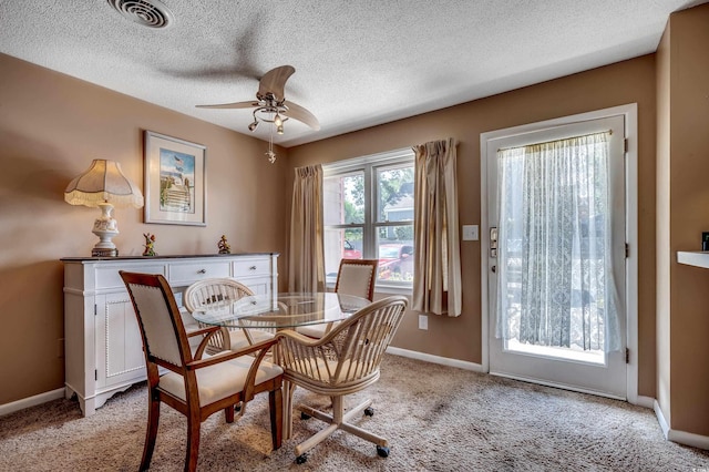 808 Myrtle Ct Unit 808, North Myrtle Beach, SC 29582 - dining space featuring ceiling fan, light carpet, and a textured ceiling