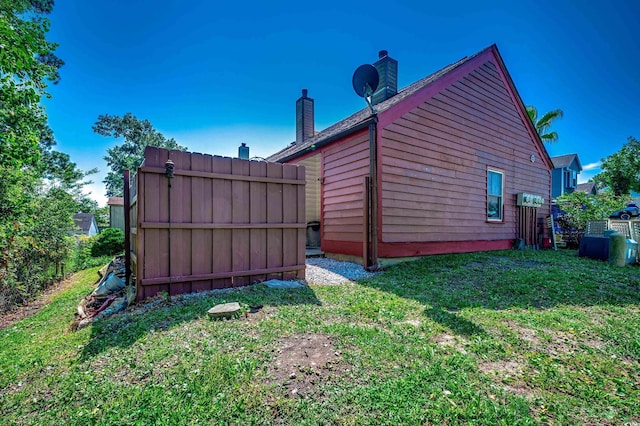 808 Myrtle Ct Unit 808, North Myrtle Beach, SC 29582 - view of side of home featuring a chimney