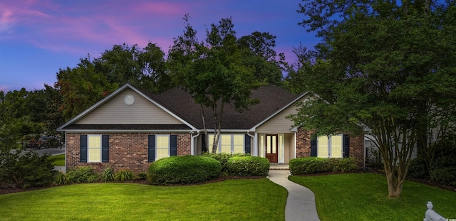 104 Ashton Cir, Myrtle Beach, SC 29588 - view of front of house featuring brick siding and a lawn