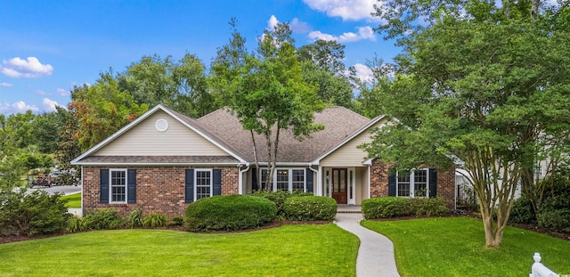 104 Ashton Cir, Myrtle Beach, SC 29588 - view of front of home featuring brick siding, a front lawn, and a shingled roof