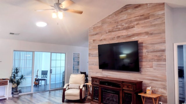 219 Birdie Way, Longs, SC 29568 - living area with lofted ceiling, a ceiling fan, and wood finished floors