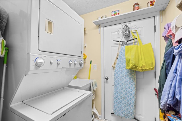 509 June Bug Ct, Myrtle Beach, SC 29588 - laundry room featuring stacked washer / dryer