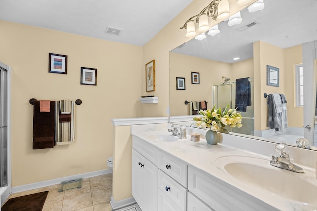 509 June Bug Ct, Myrtle Beach, SC 29588 - bathroom featuring a shower stall, double vanity, and tile patterned floors