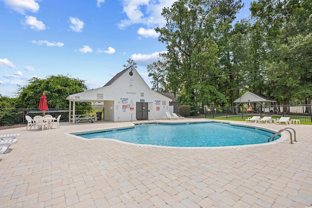 509 June Bug Ct, Myrtle Beach, SC 29588 - community pool featuring a patio