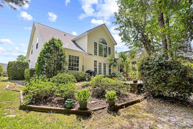 509 June Bug Ct, Myrtle Beach, SC 29588 - back of house featuring roof with shingles