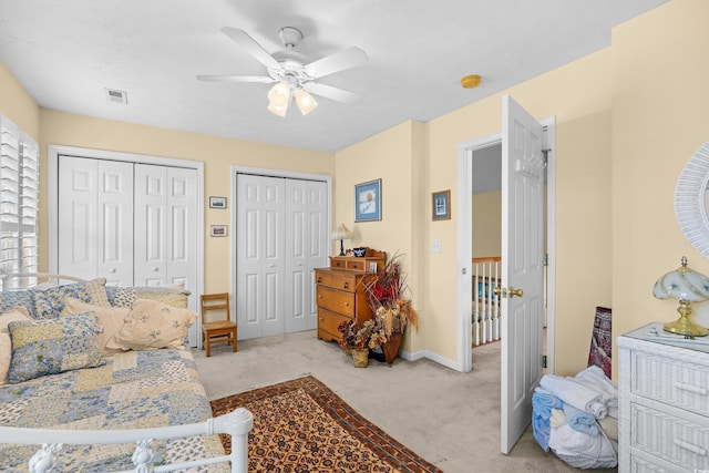 509 June Bug Ct, Myrtle Beach, SC 29588 - carpeted bedroom featuring two closets and ceiling fan