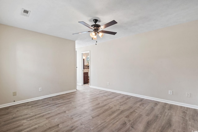 1007 Autumn Dr, Murrells Inlet, SC 29576 - spare room with a ceiling fan and wood finished floors