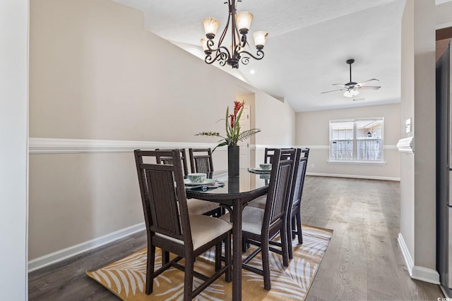1007 Autumn Dr, Murrells Inlet, SC 29576 - dining space with lofted ceiling, wood finished floors, a ceiling fan, and a chandelier