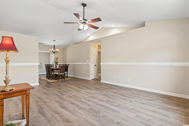 1007 Autumn Dr, Murrells Inlet, SC 29576 - living room with a ceiling fan, a chandelier, wood finished floors, vaulted ceiling, and recessed lighting