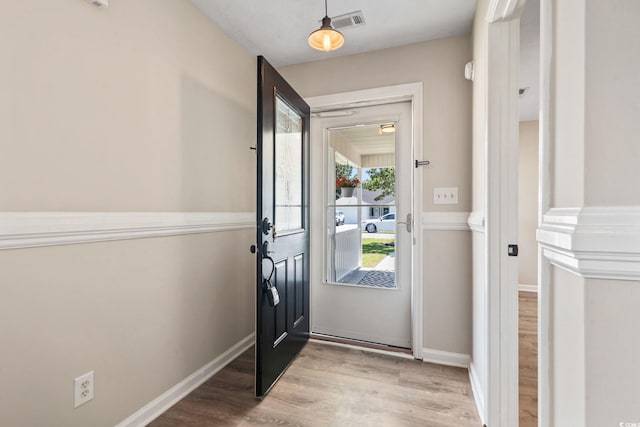 1007 Autumn Dr, Murrells Inlet, SC 29576 - entrance foyer with wood finished floors and baseboards