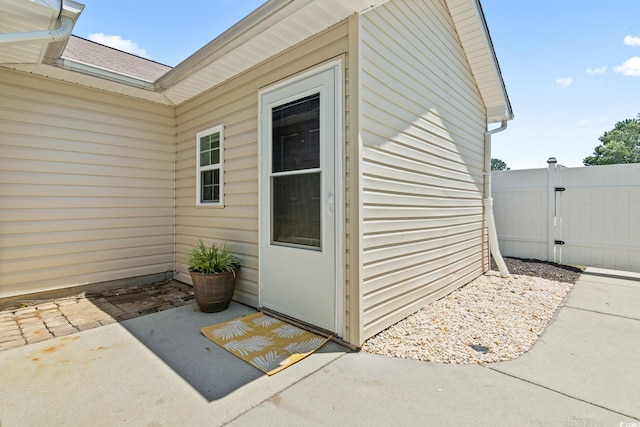 1007 Autumn Dr, Murrells Inlet, SC 29576 - view of exterior entry with a patio and a gate