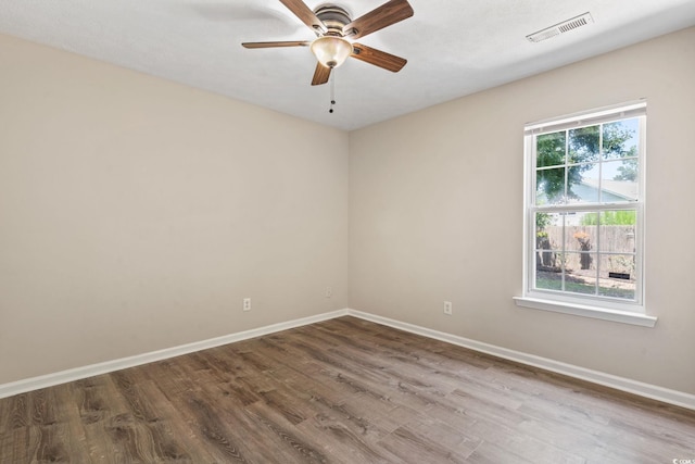 1007 Autumn Dr, Murrells Inlet, SC 29576 - unfurnished room with wood finished floors and a ceiling fan