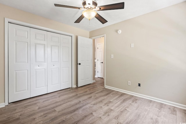 1007 Autumn Dr, Murrells Inlet, SC 29576 - unfurnished bedroom with light wood-type flooring, a closet, and a ceiling fan