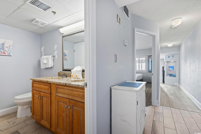 4800 S Ocean Blvd Unit 1008, North Myrtle Beach, SC 29582 - bathroom featuring wood tiled floors and vanity