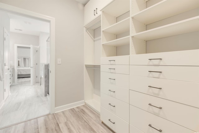 5087 Sundrop Ln, Little River, SC 29566 - spacious closet featuring light wood-style floors
