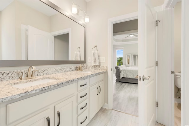 5087 Sundrop Ln, Little River, SC 29566 - bathroom with double vanity, ensuite bath, and ceiling fan
