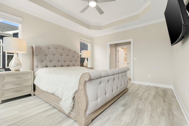 5087 Sundrop Ln, Little River, SC 29566 - bedroom with light wood finished floors, a raised ceiling, crown molding, and a ceiling fan