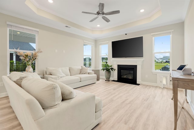 5087 Sundrop Ln, Little River, SC 29566 - living room with a tray ceiling, light wood-style floors, ornamental molding, ceiling fan, and recessed lighting