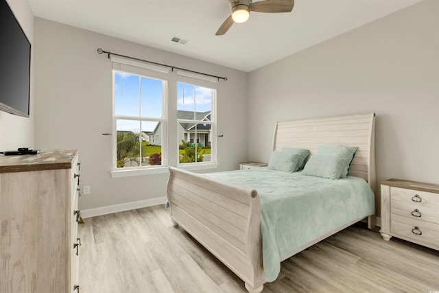 5087 Sundrop Ln, Little River, SC 29566 - bedroom featuring light wood-type flooring and ceiling fan