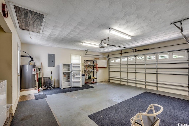 220 Gateway Dr, Little River, SC 29566 - garage with electric water heater, a garage door opener, and electric panel