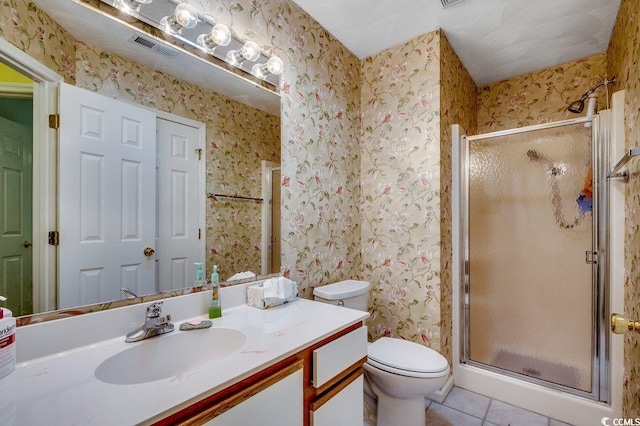 220 Gateway Dr, Little River, SC 29566 - bathroom featuring vanity, wallpapered walls, tile patterned flooring, and a stall shower